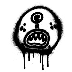 graffiti emoji of a monster head with one eye sprayed black © kadiran