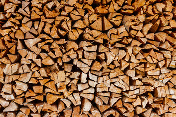 Background of the stacked dry chopped firewood