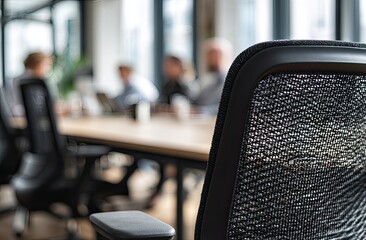 Blurred office meeting scene