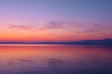 Obraz premium Calm sunset over water