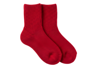 Two vibrant red ribbed ankle socks are presented against a pure black background.