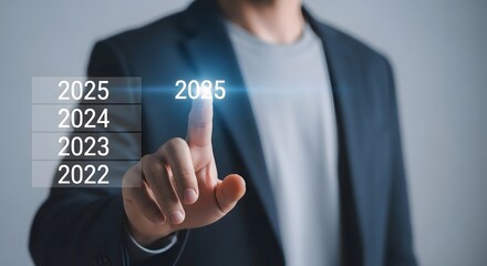 Business man selecting year on screen for future planning and strategy in corporate growth plan
