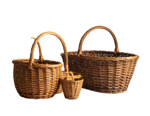 Three wicker baskets of varying sizes, arranged in a slightly overlapping diagonal formation