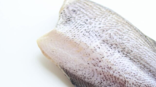 Side view of Freshly cut gourami fish on a white background. For Food