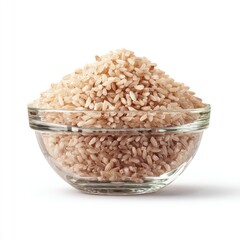 Light tan brown rice in a clear glass bowl, isolated on white