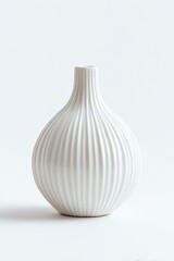 A pristine, white ceramic vase with a bulbous body and vertical ribs
