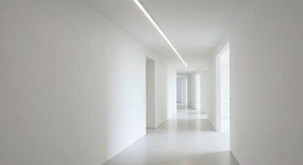 Obraz premium A stark white hallway with a linear ceiling light doors spaced along its length