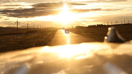 sunset over the road