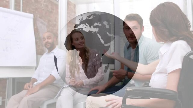 Animated globe rotating in training sparking speaker gesturing at flipchart while colleague noting