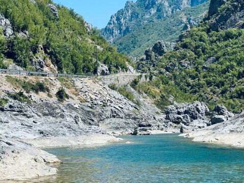 Kanioni i Kirit with the &lsquo;Ura e Shtrenjt&euml;&rsquo; (Holy Bridge) in Albania, featuring dramatic cliffs, turquoise water, and a picturesque natural setting