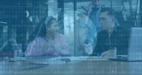 Coworkers writing and speaking in business meeting after globe emerging binary code overlaying - Powered by Adobe