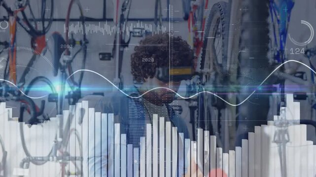 Bike technician grabbing screwdriver and tuning spokes in repair workshop, inspecting wheel spin