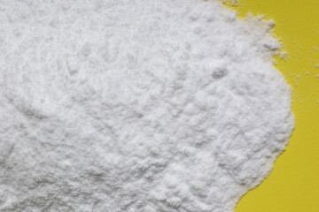 White creatine powder, used as a pre-workout supplement for gym and fitness.