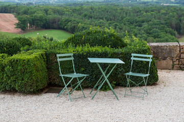 Chairs and table in a country garden