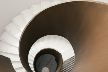 Fototapeta premium Spiral staircase with modern design and stylish interior renovation