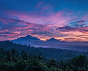 Sunrise over misty mountains