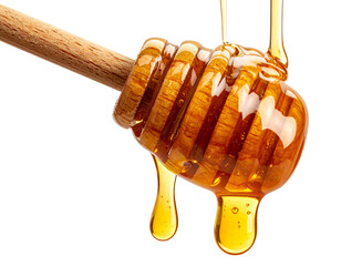 Honey dripping from a wooden dipper