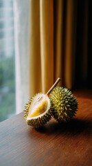 Durian fruit on wooden surface