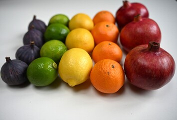 Colorful assortment of fresh organic fruits arranged as a rainbow. Ideal for health brands, juice ads, and organic lifestyle promotions.