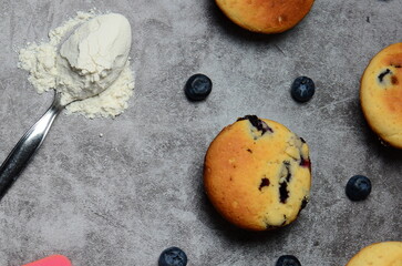 A food shot of a homemade freshly baked Blueberry cupcakes.