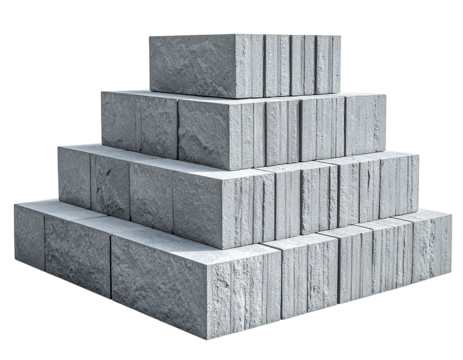 Stacked light gray stone blocks forming a pyramid