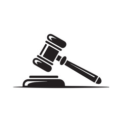 A judge's wooden gavel and law book, symbols of legal authority and justice in a courtroom