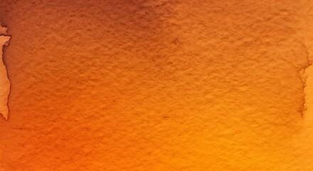Naklejka premium A close-up abstract watercolor texture with a gradient of warm orange and yellow hues.