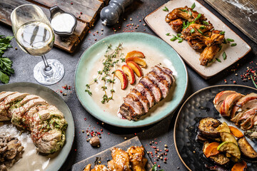 Assorted meat dishes with wine