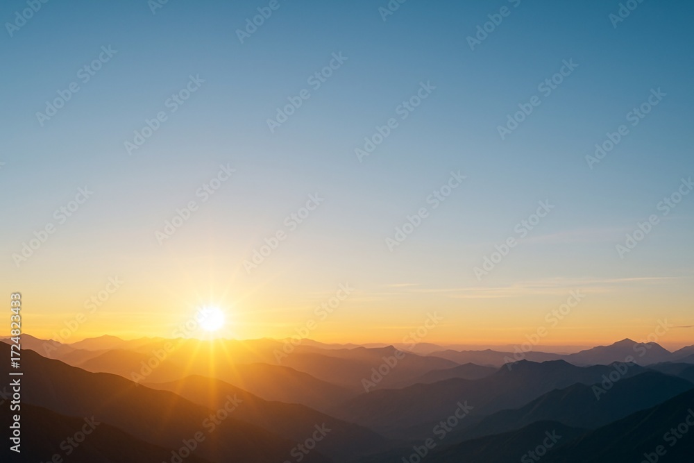 Poster scenic sunrise over layered mountain ranges with clear sky, offering peaceful natural background and