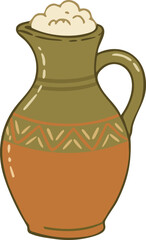 Foamy spiced drink in tall ceramic pitcher