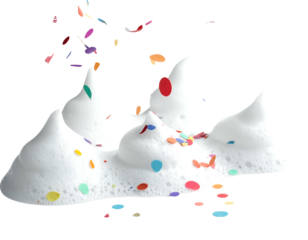 Whipped cream topped with colorful sprinkles, in a mountain-like shape, with more sprinkles falling around