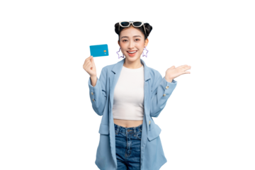 portrait Asian Woman holding a credit card, presenting a product. The woman is smiling and the setting feels cheerful on PNG