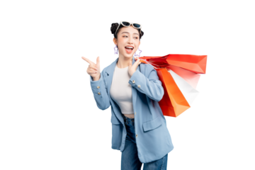 portrait Asian Woman  smiles brightly with shopping bags, pointing forward on PNG