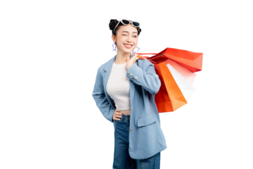 portrait Asian Woman  holding shopping bags while smiling and enjoying her shopping experience. She is fashionable, and radiating happiness on PNG