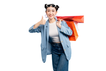 portrait Asian Woman  giving a thumbs up, carrying shopping bags, radiating positivity and excitement on PNG