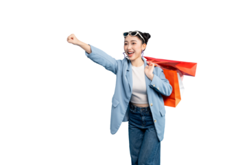 portrait Asian Woman shopping, carrying colorful bags and filled with excitement. She is smiling and extending her arm, ready to purchase more items on PNG
