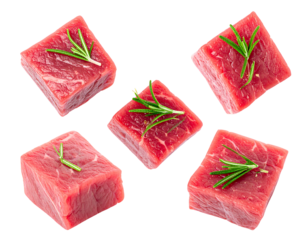 Fresh beef cubes, seasoned with rosemary sprigs, arranged in a grid pattern