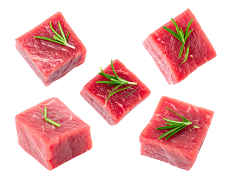 Fresh beef cubes, seasoned with rosemary sprigs, arranged in a grid pattern
