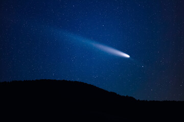 Countryside silhouettes with comet and Milky Way on the sky. © astrosystem