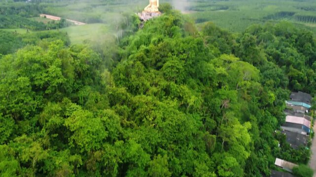 &ldquo;Phra Phuttha Sihingkhiri Sritat Buddha &ndash; Golden Statue on Khao Phra Mountain, Phipun, Thailand&rdquo;