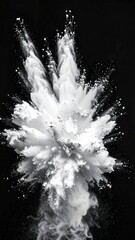 A dynamic cloud of white powder erupts against a stark black backdrop, creating a burst of motion and texture in a striking composition