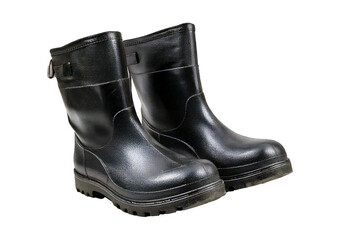 Dirty black rubber boots after outdoor work isolated on transparent or white background
