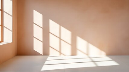Obraz premium Sunlight streams through window into a peach-colored room.