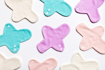 Eco-friendly reusable fabric women's pads. set of colorful bright reusable menstrual pads. zero waste woman periods concept top view with copy space