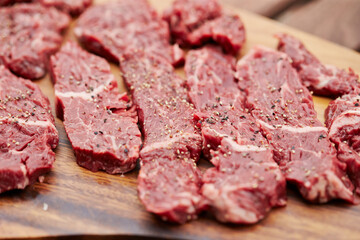 raw meat on a cutting board