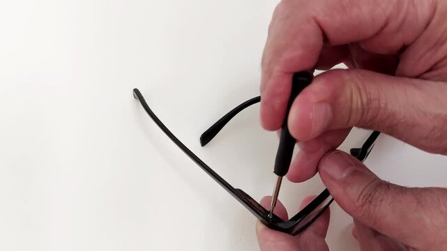 Quick fix for loose eyeglass hinges. Watch how to tighten a tiny screw using a precision mini screwdriver-perfect for DIY eyewear repairs at home. Fast, simple, effective