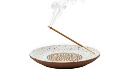 Incense stick burning with smoke rising from a decorative dish, isolated on transparent background