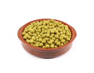 Boiled peas in a clay serving bowl on white background.