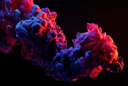 An abstract cloud of color explodes from darkness. Blues morph into fiery reds and purples in a swirling, captivating, three-dimensional dance