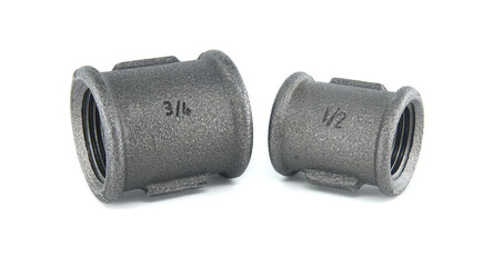 Two Metal Pipe Fittings Couplings In 1/2 And 3/4 Inch Sizes For Plumbing Projects